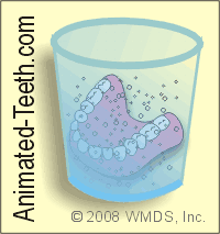 Animation of a denture soaking in an effervescent cleaner.